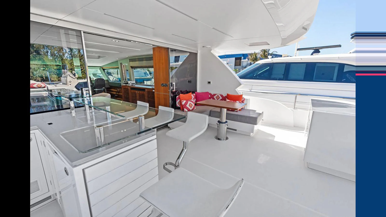 a room with a table and chairs aboard MOBILLITY Yacht for Sale