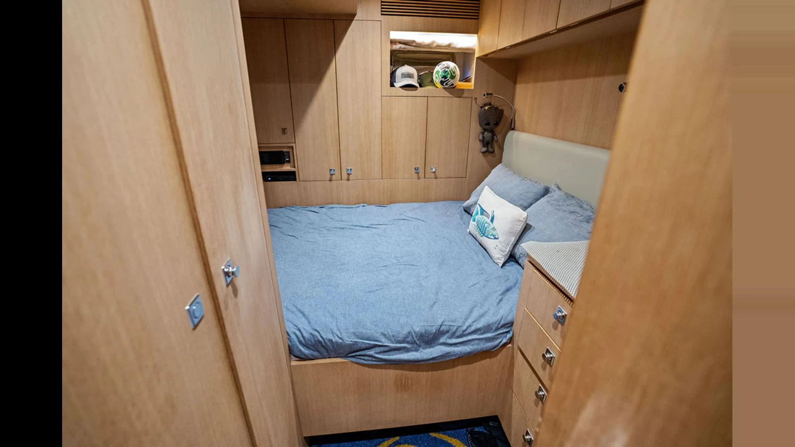 a bed in a room aboard MOBILLITY Yacht for Sale