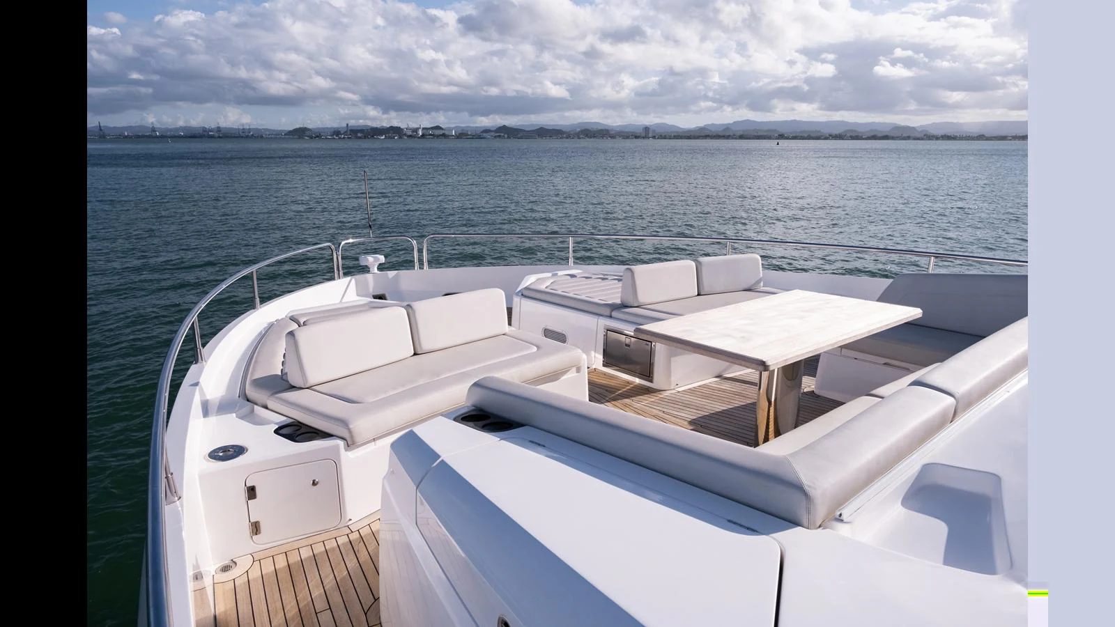 The foredeck offers a spacious seating area with plush cushions and a central table, perfect for relaxing and enjoying the view. aboard ONLY 1100 HRS! Yacht for Sale