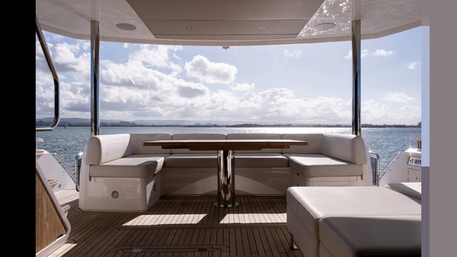 The aft deck offers a serene seating area with panoramic ocean views. aboard ONLY 1100 HRS! Yacht for Sale