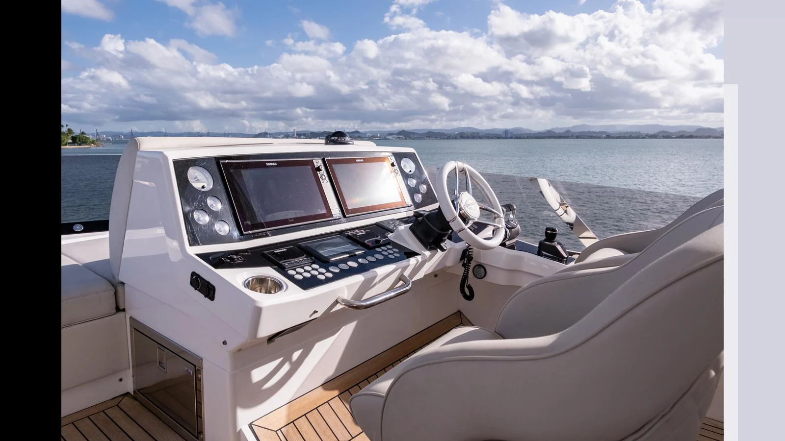 The helm station offers a commanding view with state-of-the-art navigation equipment and comfortable seating. aboard ONLY 1100 HRS! Yacht for Sale