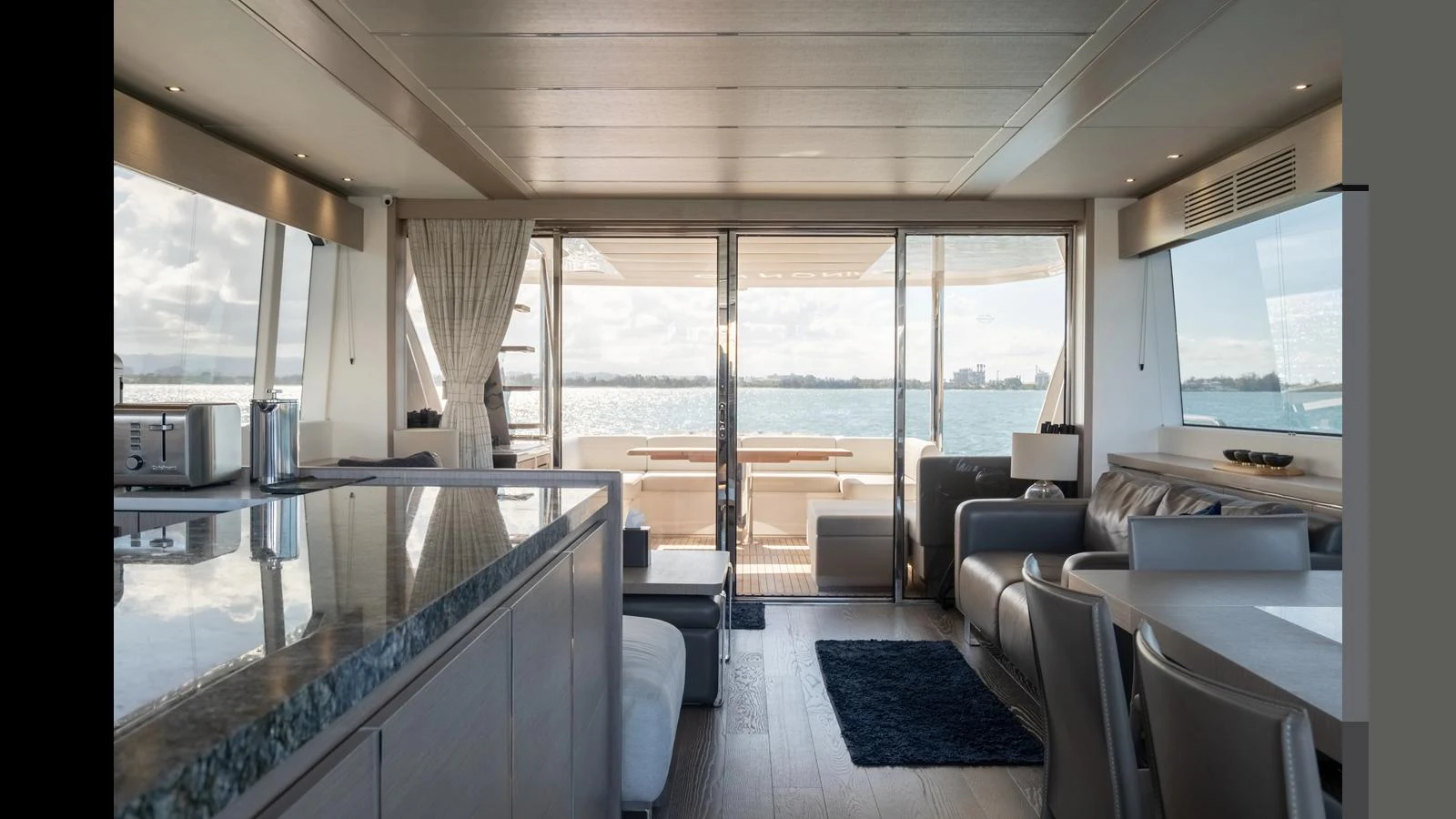 The salon offers a spacious and elegant area with panoramic views and luxurious furnishings. aboard ONLY 1100 HRS! Yacht for Sale