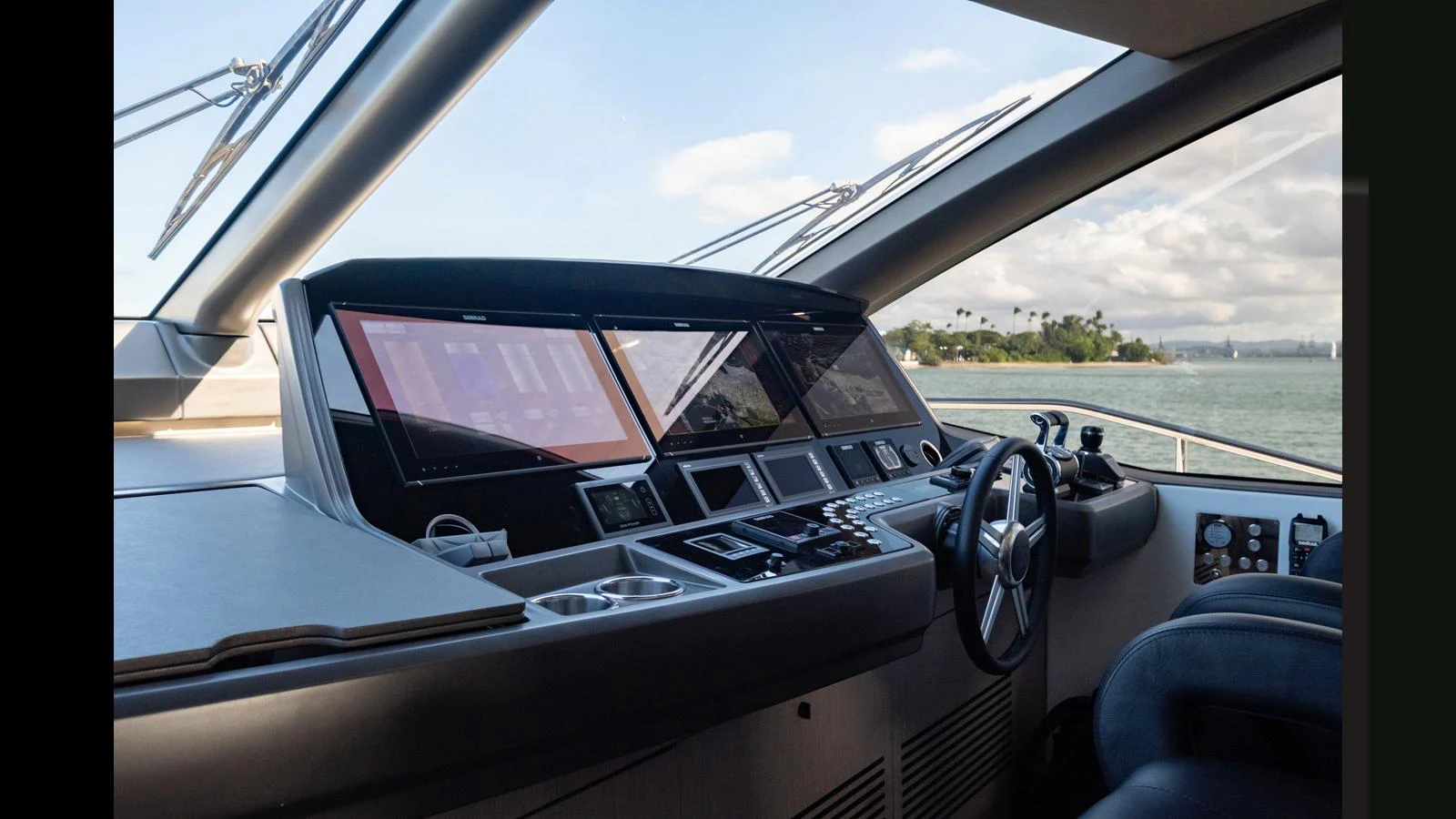 The helm station offers a sleek and modern control center with advanced navigation equipment and panoramic views. aboard ONLY 1100 HRS! Yacht for Sale