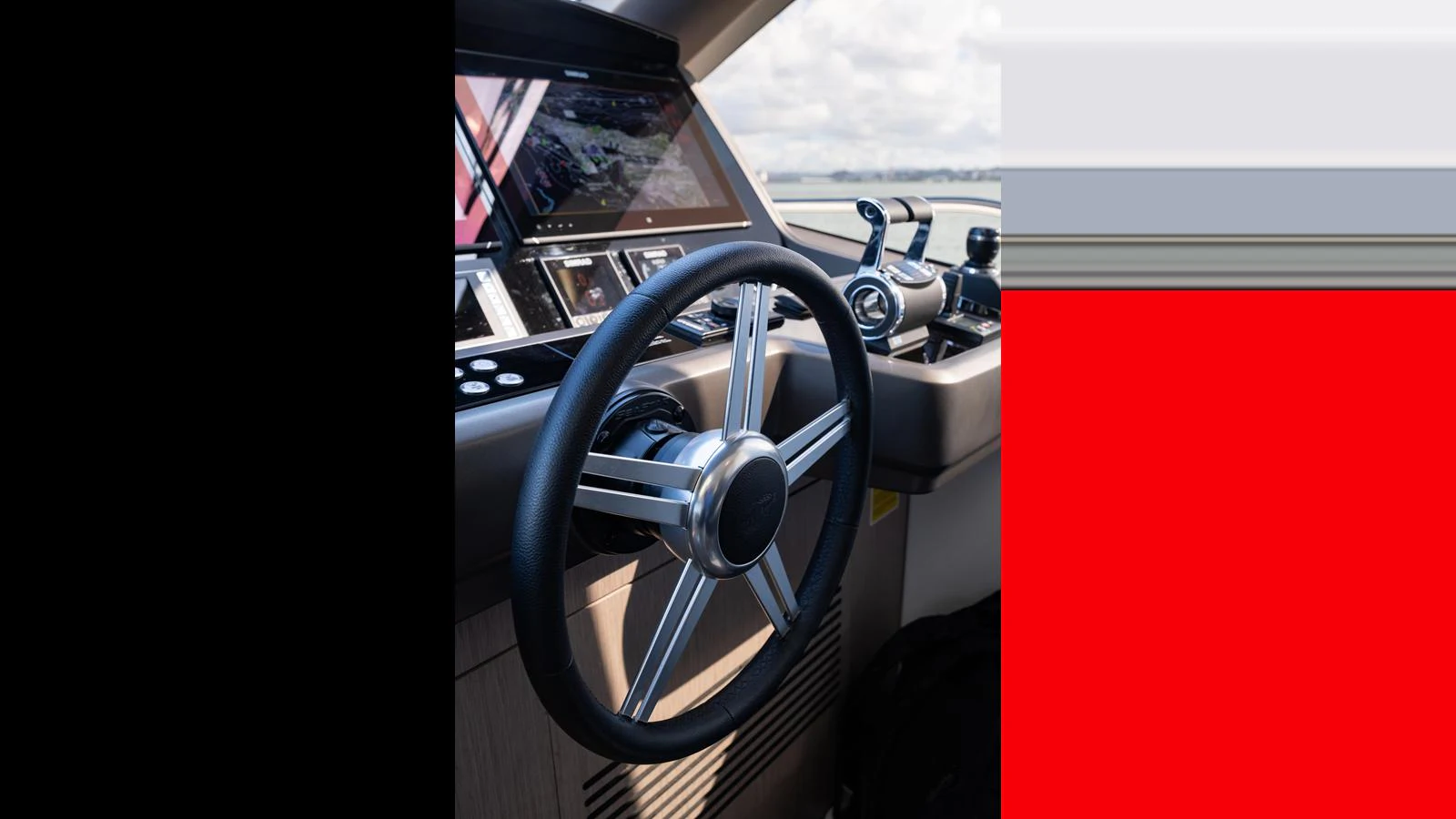 The helm station features a sleek steering wheel and advanced navigation controls. aboard ONLY 1100 HRS! Yacht for Sale