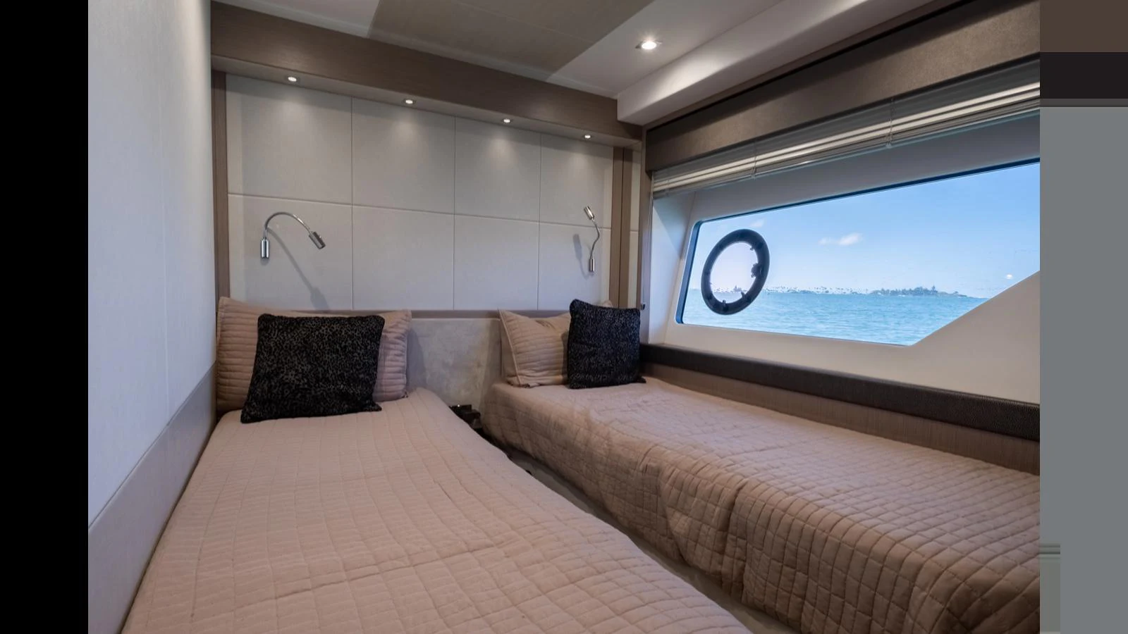 The twin stateroom offers cozy accommodations with a large window providing a scenic view of the sea. aboard ONLY 1100 HRS! Yacht for Sale
