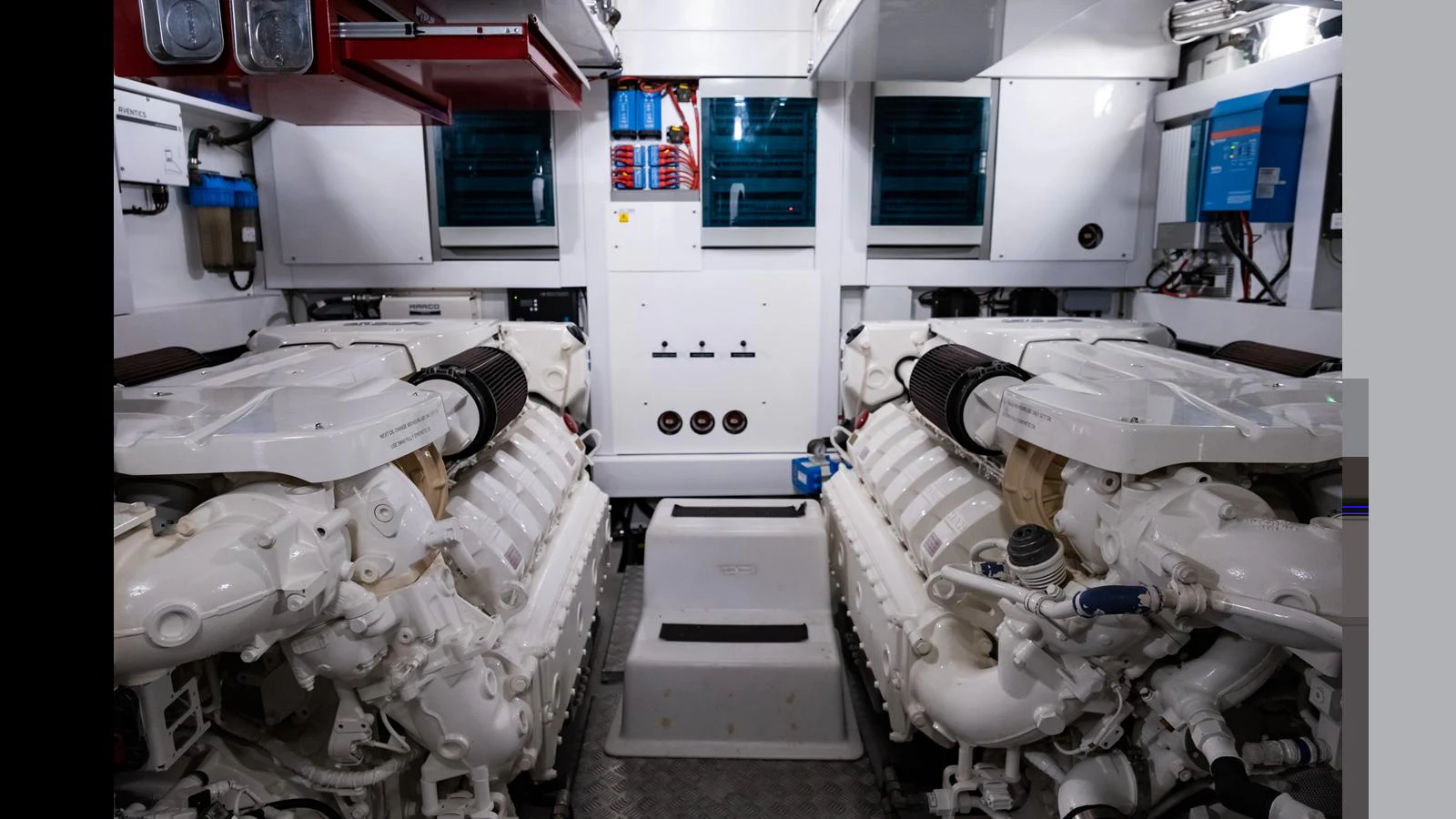 The engine room showcases powerful twin engines and a well-organized layout. aboard ONLY 1100 HRS! Yacht for Sale