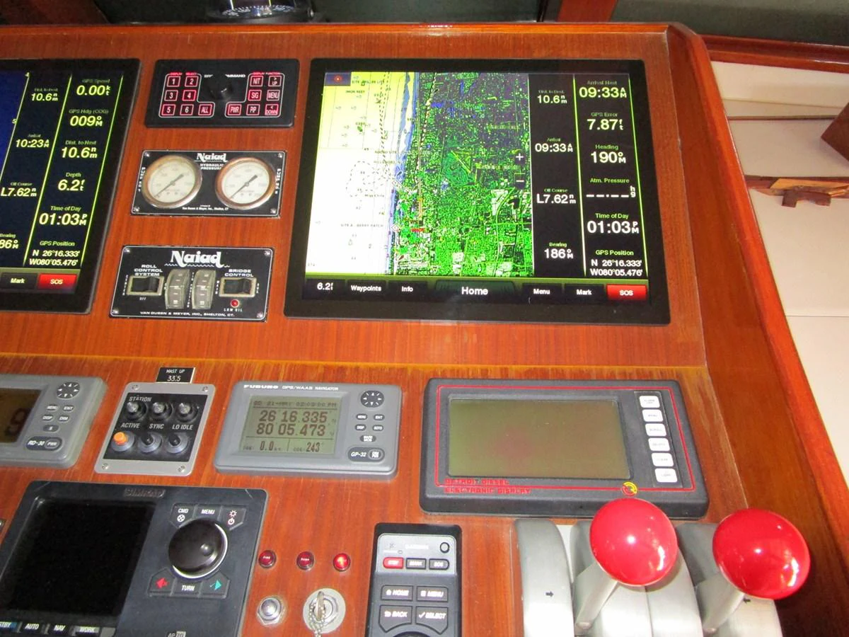 The helm station features advanced navigation and control systems for precise yacht operation. aboard SHEPSL X Yacht for Sale