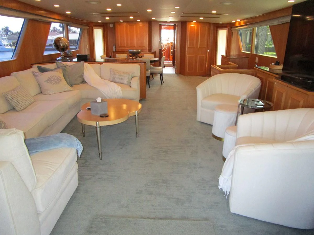 The spacious salon features plush seating and elegant decor, perfect for relaxation and entertainment. aboard SHEPSL X Yacht for Sale