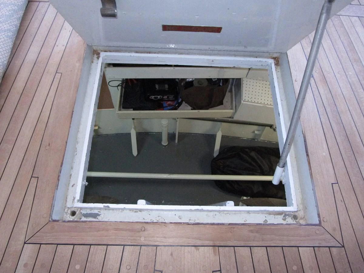 A hatch on the deck opens to reveal a storage compartment below. aboard SHEPSL X Yacht for Sale