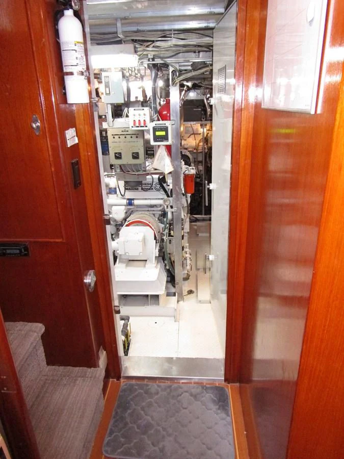 The image showcases the yacht's well-maintained engine room with visible machinery and equipment. aboard SHEPSL X Yacht for Sale