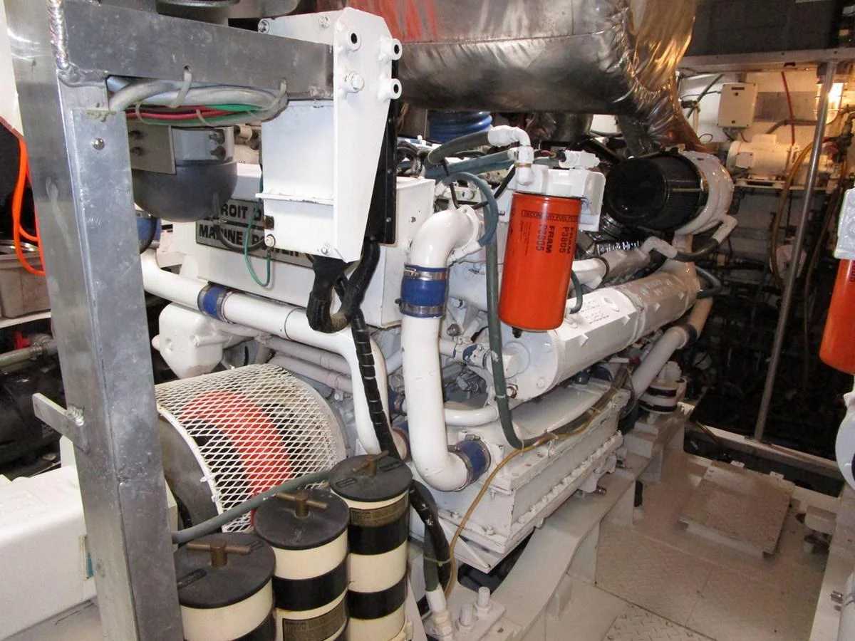 The image showcases the yacht's well-maintained engine room with visible machinery and components. aboard SHEPSL X Yacht for Sale