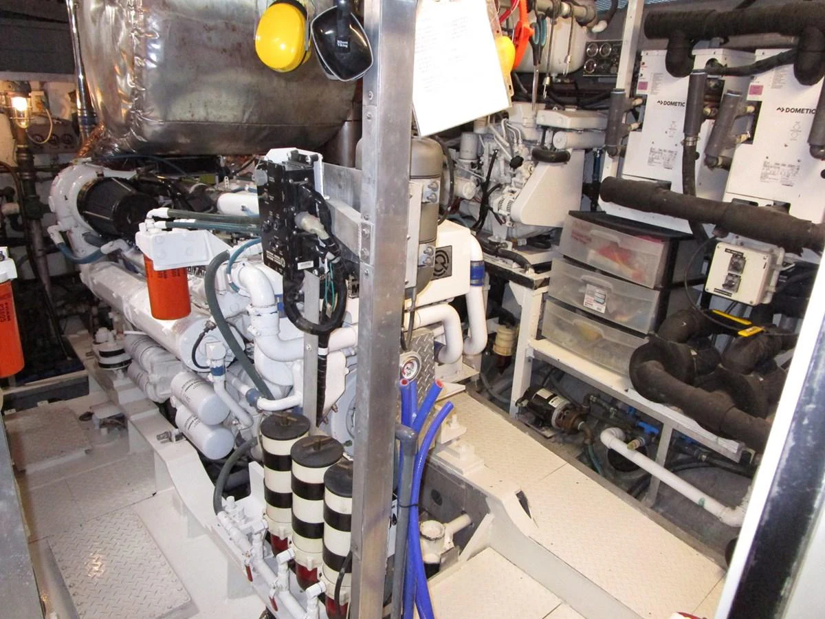 The image showcases the well-organized and meticulously maintained engine room of the yacht. aboard SHEPSL X Yacht for Sale