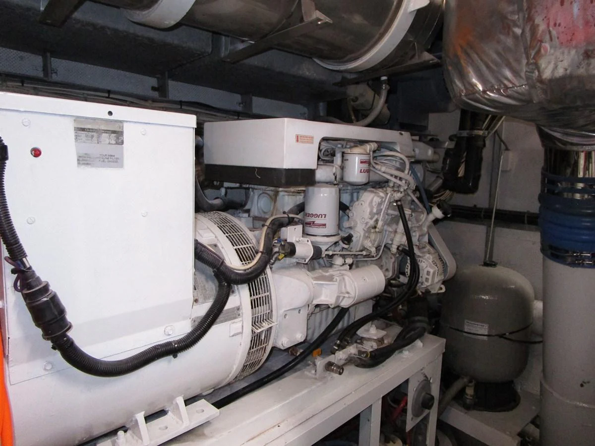 The image showcases the yacht's engine room with visible machinery and equipment. aboard SHEPSL X Yacht for Sale