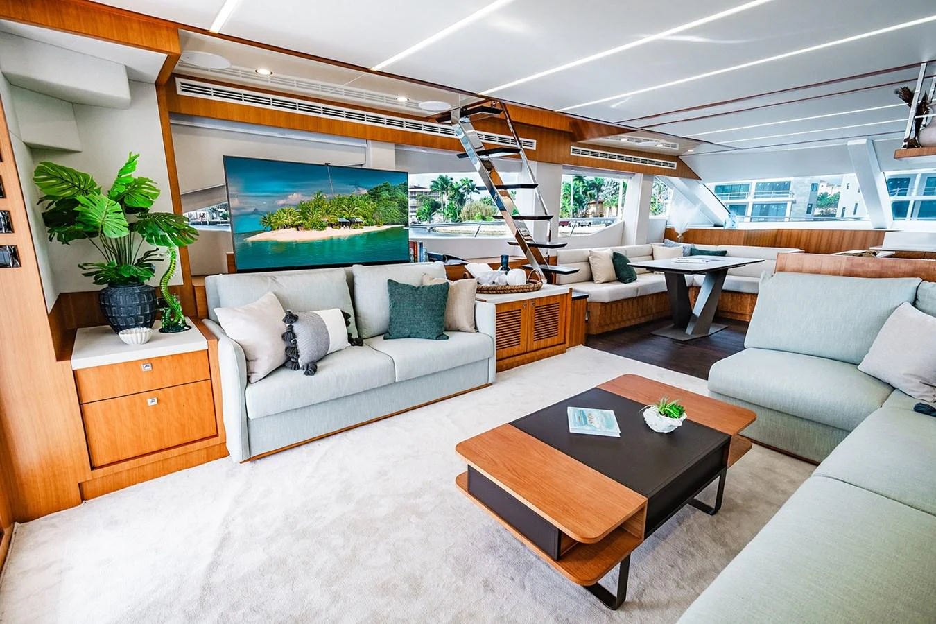 The salon features a spacious and modern design with comfortable seating and elegant decor. aboard INDIGO Yacht for Sale