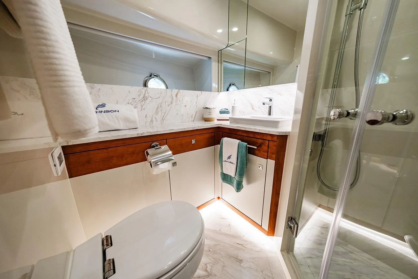 The yacht's bathroom features a sleek design with modern fixtures and luxurious finishes. aboard INDIGO Yacht for Sale