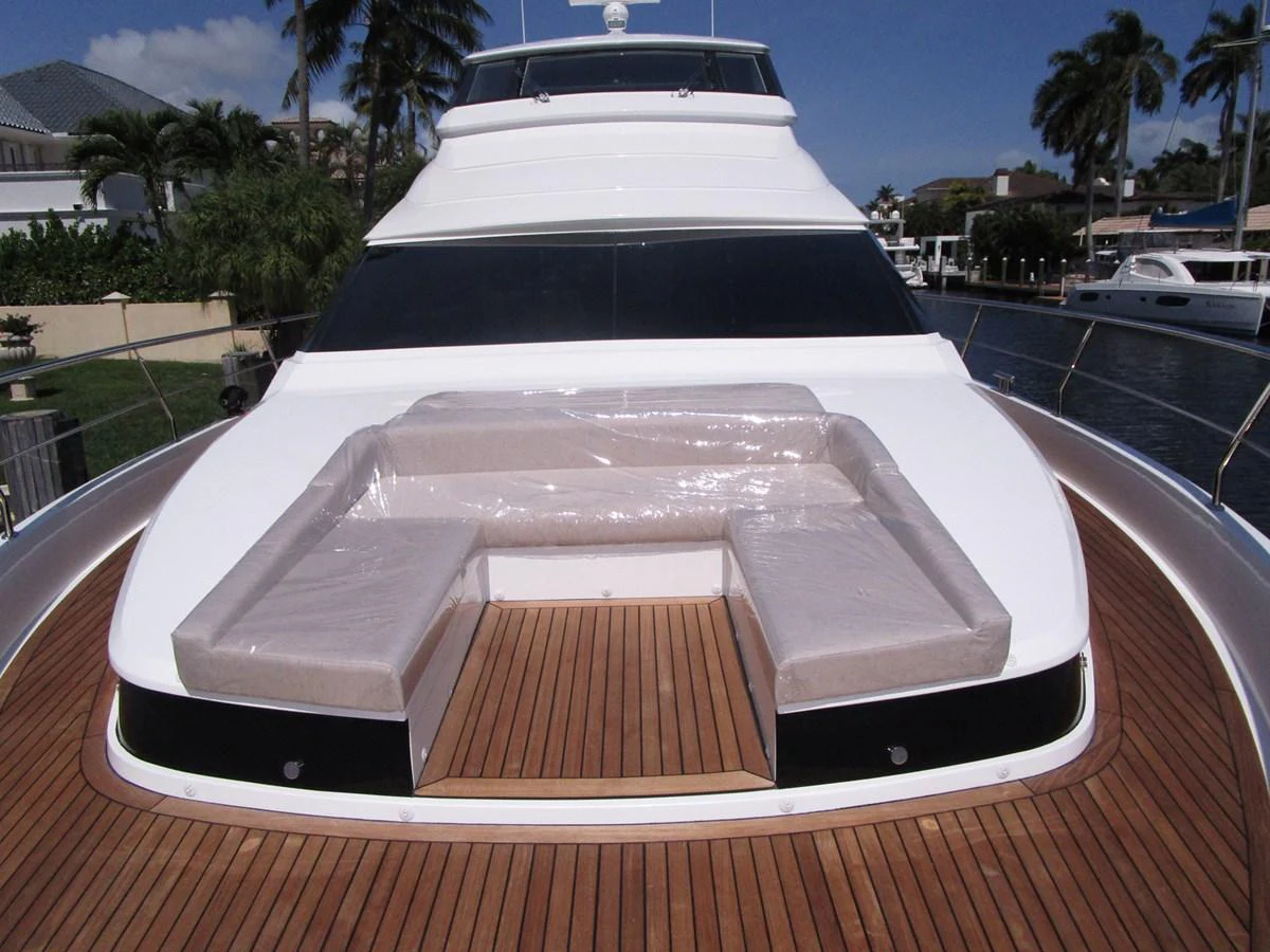 The foredeck features a spacious sunpad with cushioned seating, perfect for relaxation. aboard INDIGO Yacht for Sale