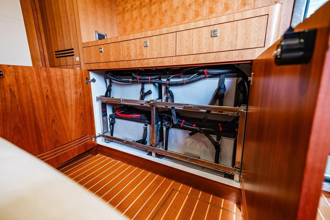 The image showcases a neatly organized storage compartment within the yacht, featuring foldable bicycles. aboard INDIGO Yacht for Sale