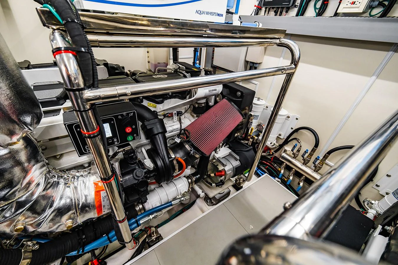 The image showcases the yacht's well-maintained engine room with modern machinery. aboard INDIGO Yacht for Sale