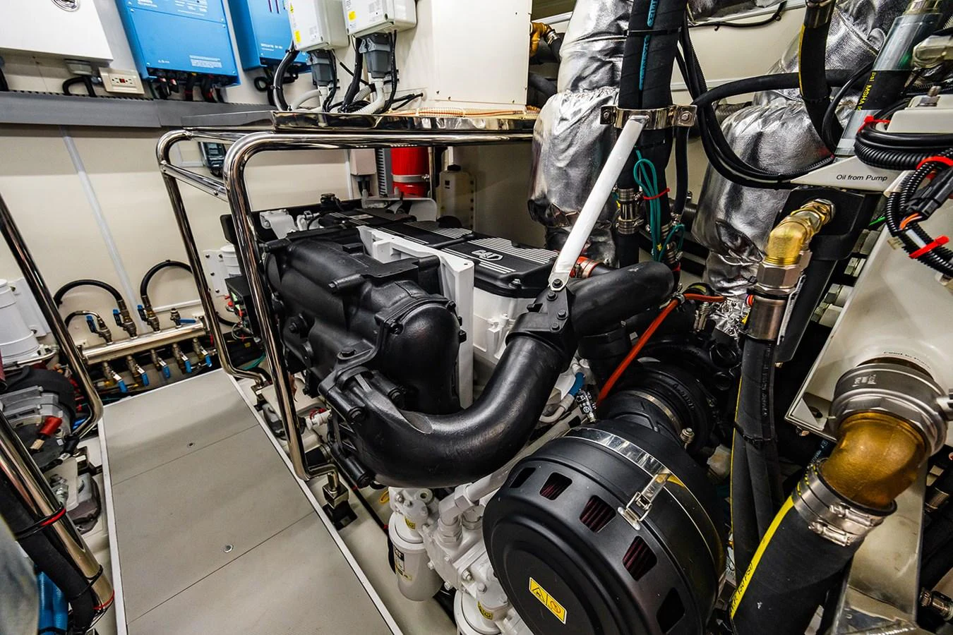 The image showcases the yacht's well-maintained engine room with advanced machinery. aboard INDIGO Yacht for Sale