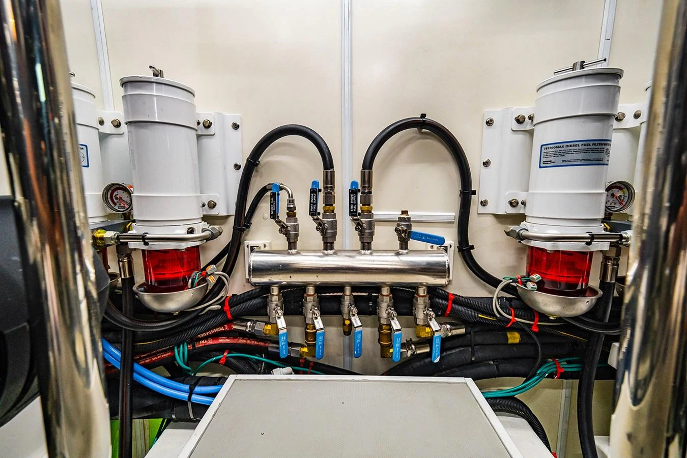 The image showcases the yacht's engine room with detailed view of the fuel filtration system. aboard INDIGO Yacht for Sale