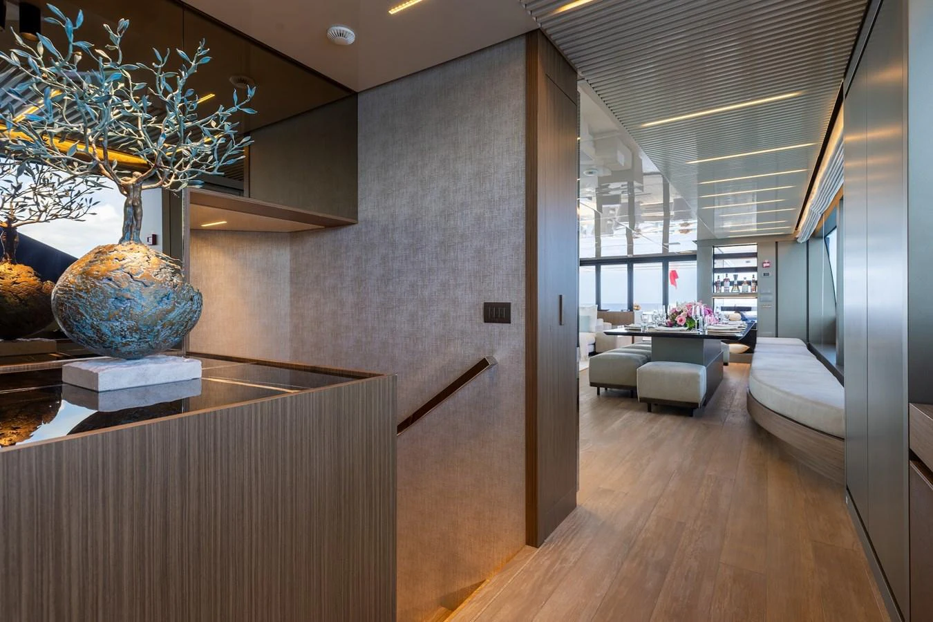 The yacht's interior features a modern and elegant design with a spacious seating area and tasteful decor. aboard AMBAR Yacht for Sale