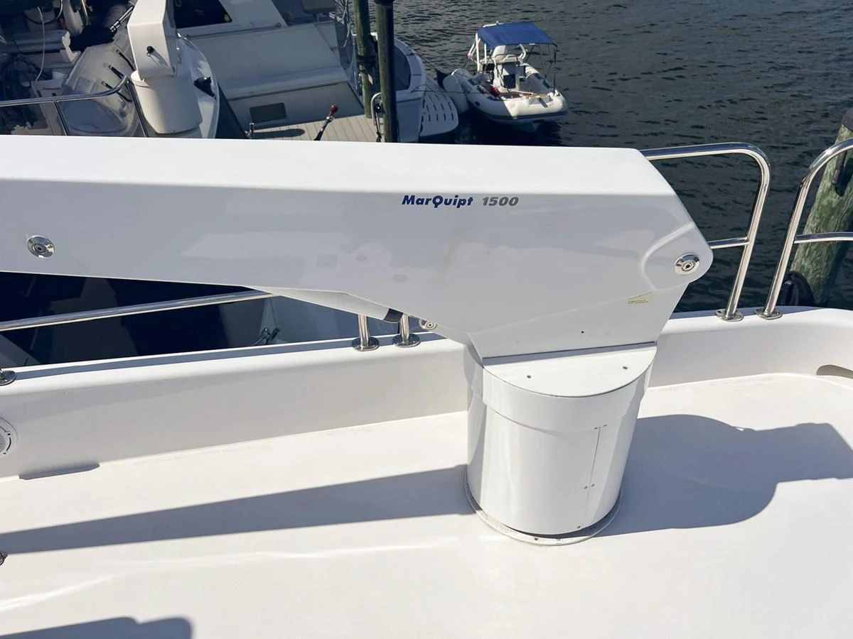 A close-up view of a MarQuip 1500 crane on the yacht's deck. aboard KRISTIN LEE Yacht for Sale