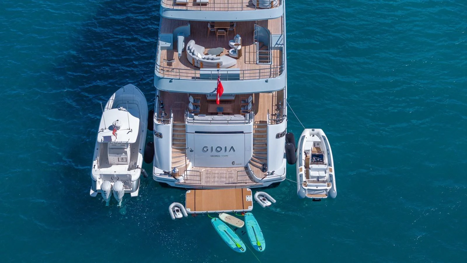 The yacht's aft deck is beautifully showcased with various water toys and tenders ready for adventure. aboard GIOIA Yacht for Sale