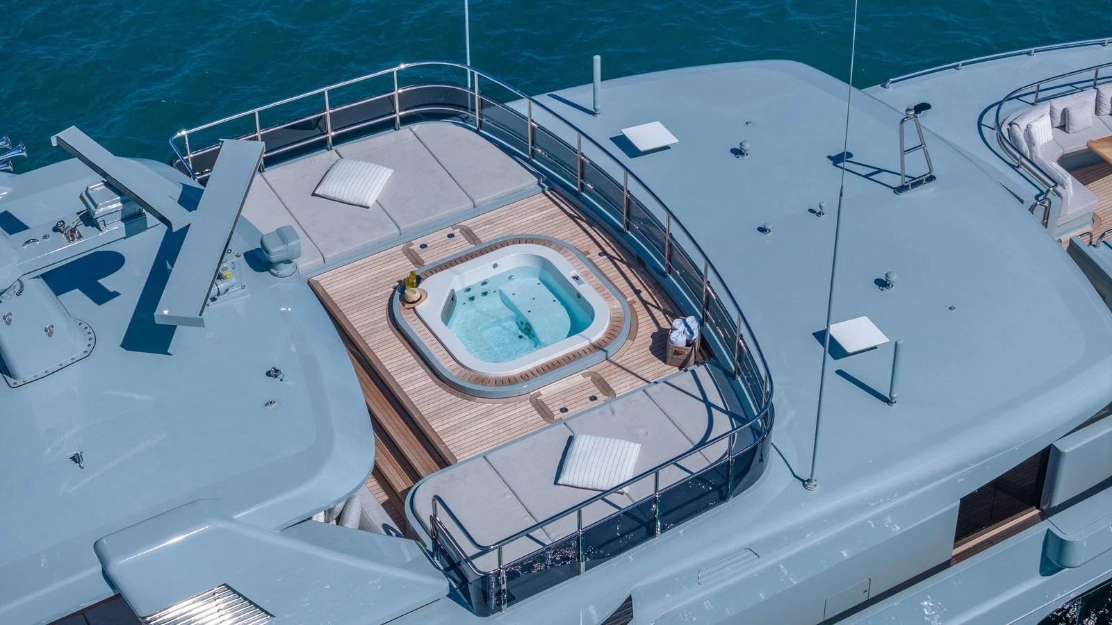 The sundeck features a luxurious jacuzzi surrounded by ample lounging space. aboard GIOIA Yacht for Sale