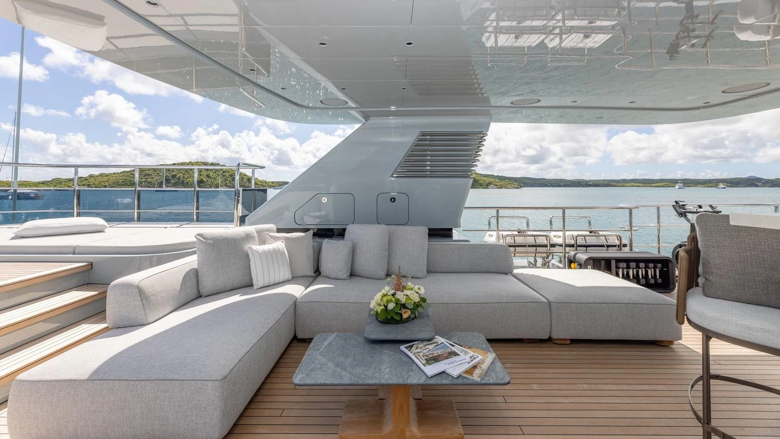 The aft deck features a luxurious seating area with a stunning view of the surrounding waters. aboard GIOIA Yacht for Sale