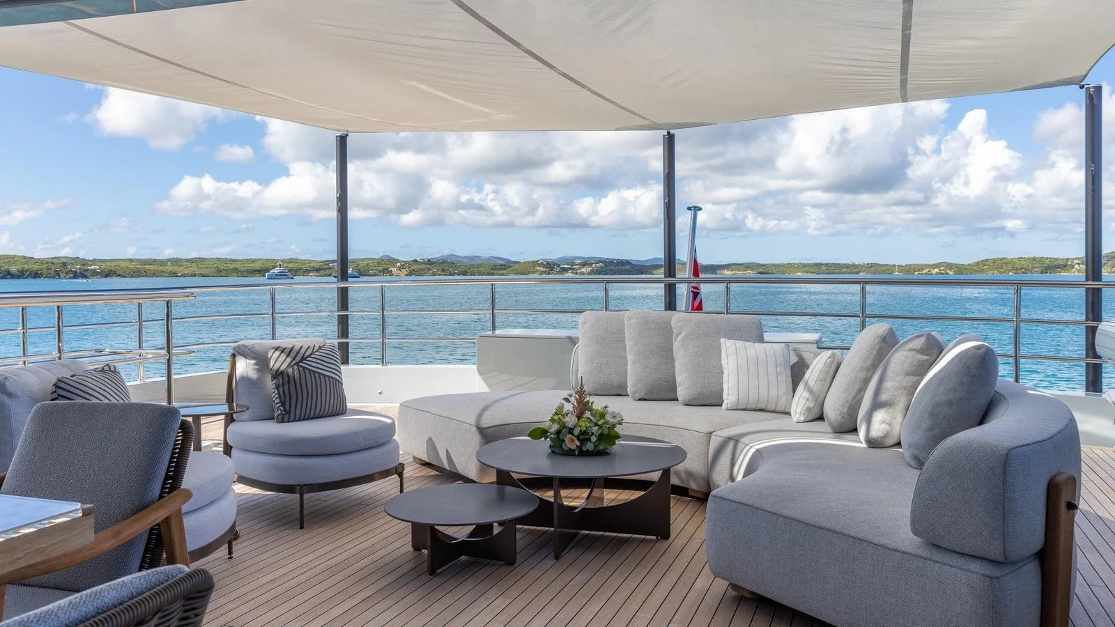 The sundeck offers a luxurious lounging area with comfortable seating and stunning ocean views. aboard GIOIA Yacht for Sale