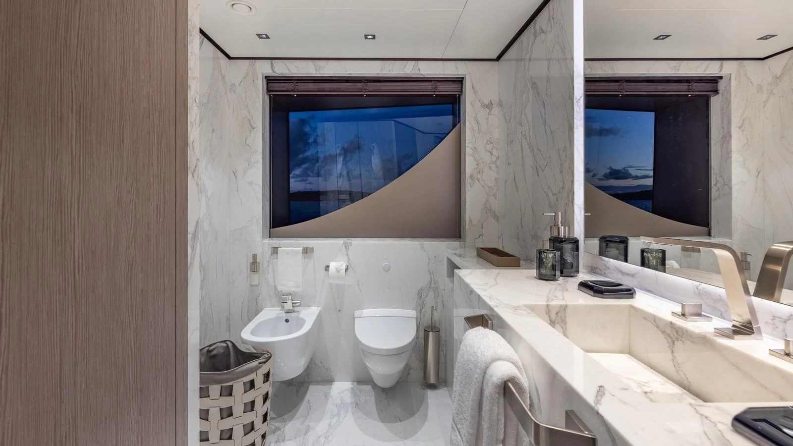 The yacht's bathroom features elegant marble surfaces and modern fixtures. aboard GIOIA Yacht for Sale