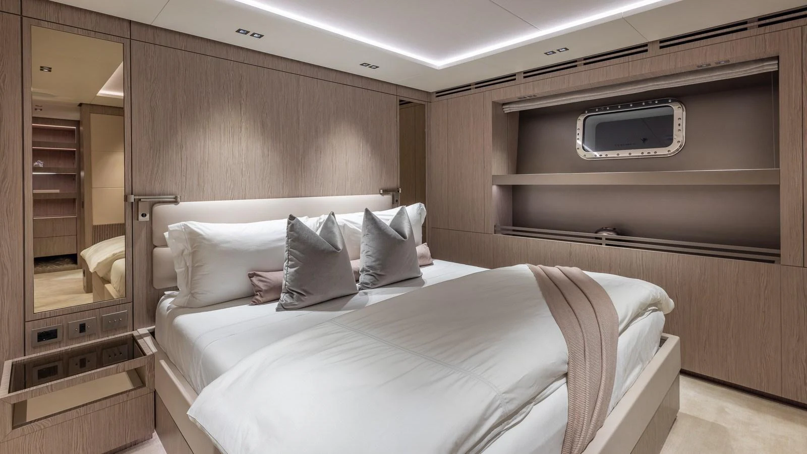 A luxurious stateroom featuring a comfortable bed and elegant decor. aboard GIOIA Yacht for Sale