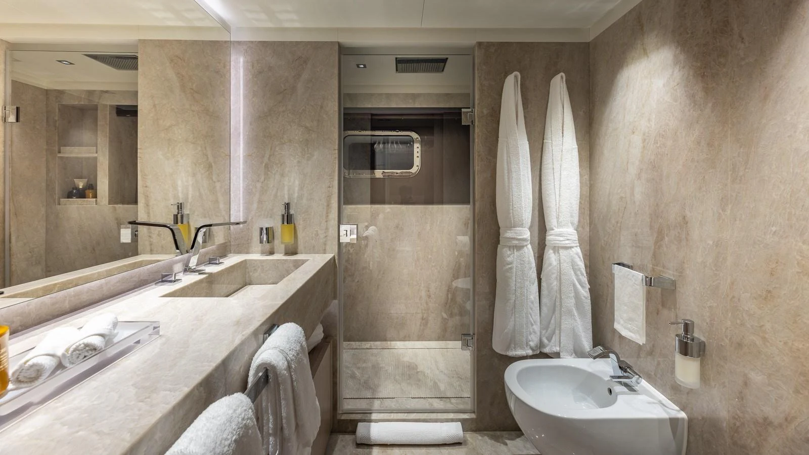 The yacht's bathroom features elegant marble surfaces and modern fixtures. aboard GIOIA Yacht for Sale