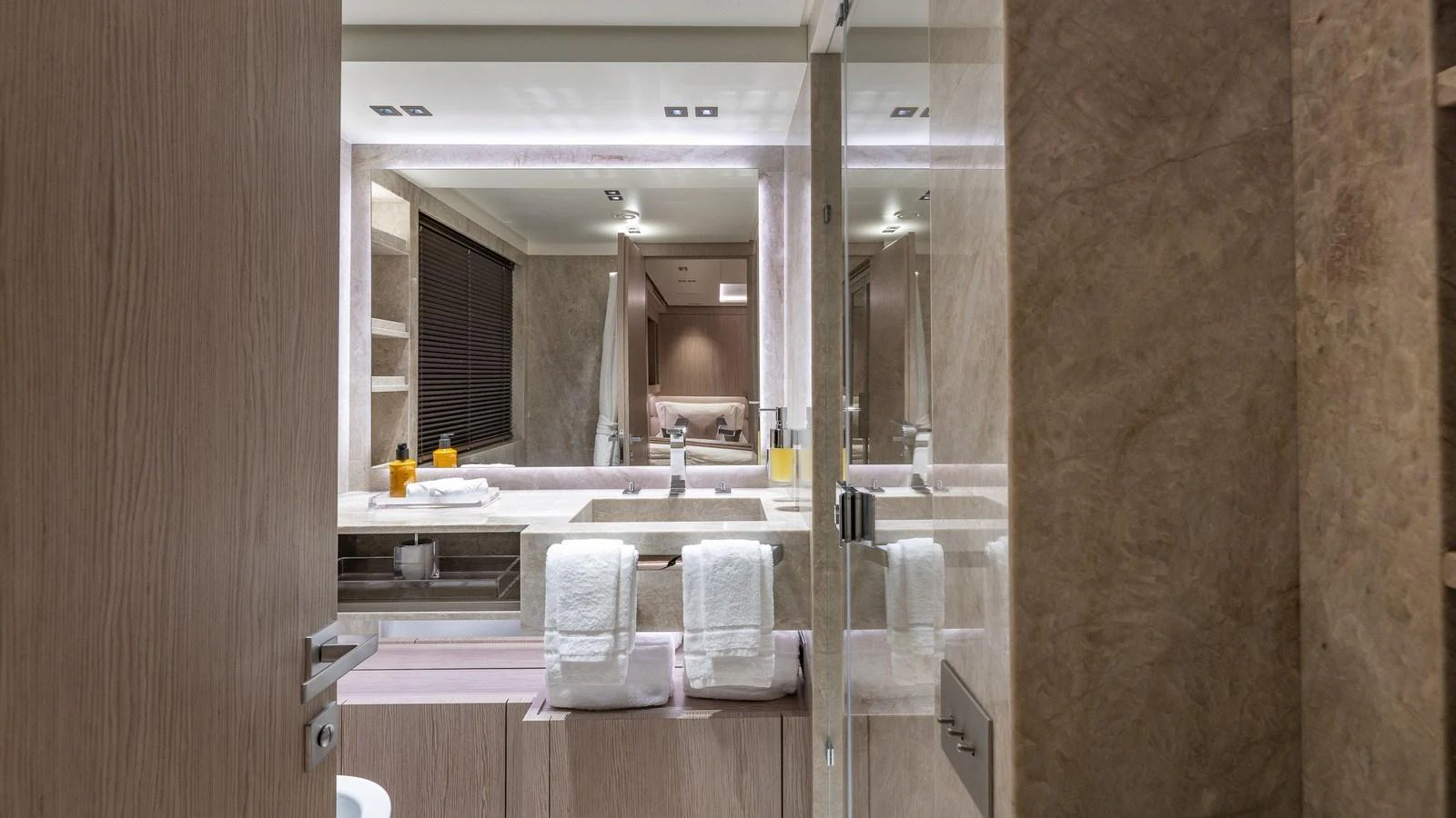 A luxurious yacht bathroom featuring modern fixtures and elegant design. aboard GIOIA Yacht for Sale
