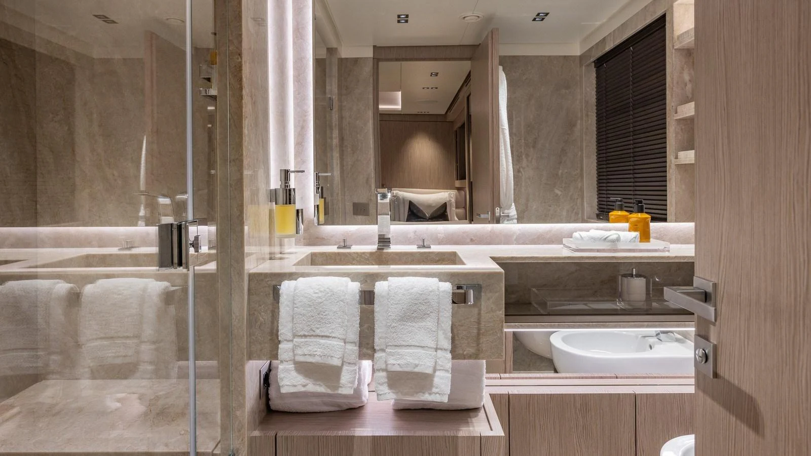 The bathroom features elegant fixtures and a luxurious design. aboard GIOIA Yacht for Sale