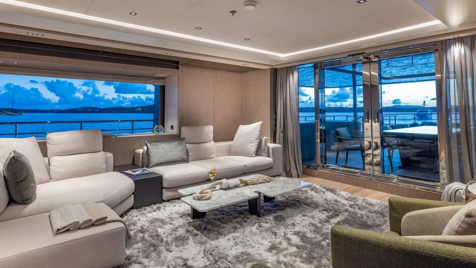 The yacht's salon offers a luxurious and comfortable space with stunning views of the sea. aboard GIOIA Yacht for Sale