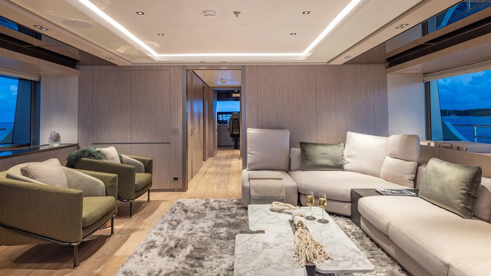 The yacht's salon features a modern and comfortable seating area with ample natural light. aboard GIOIA Yacht for Sale