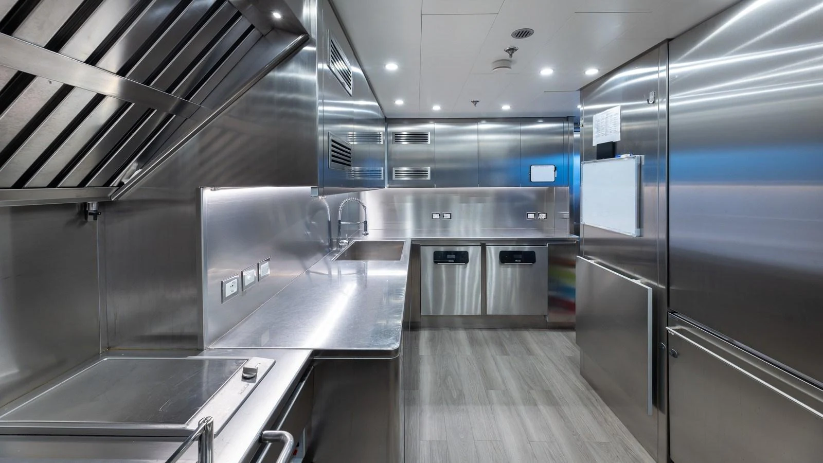 The yacht's galley features sleek stainless steel appliances and ample counter space for gourmet cooking. aboard GIOIA Yacht for Sale