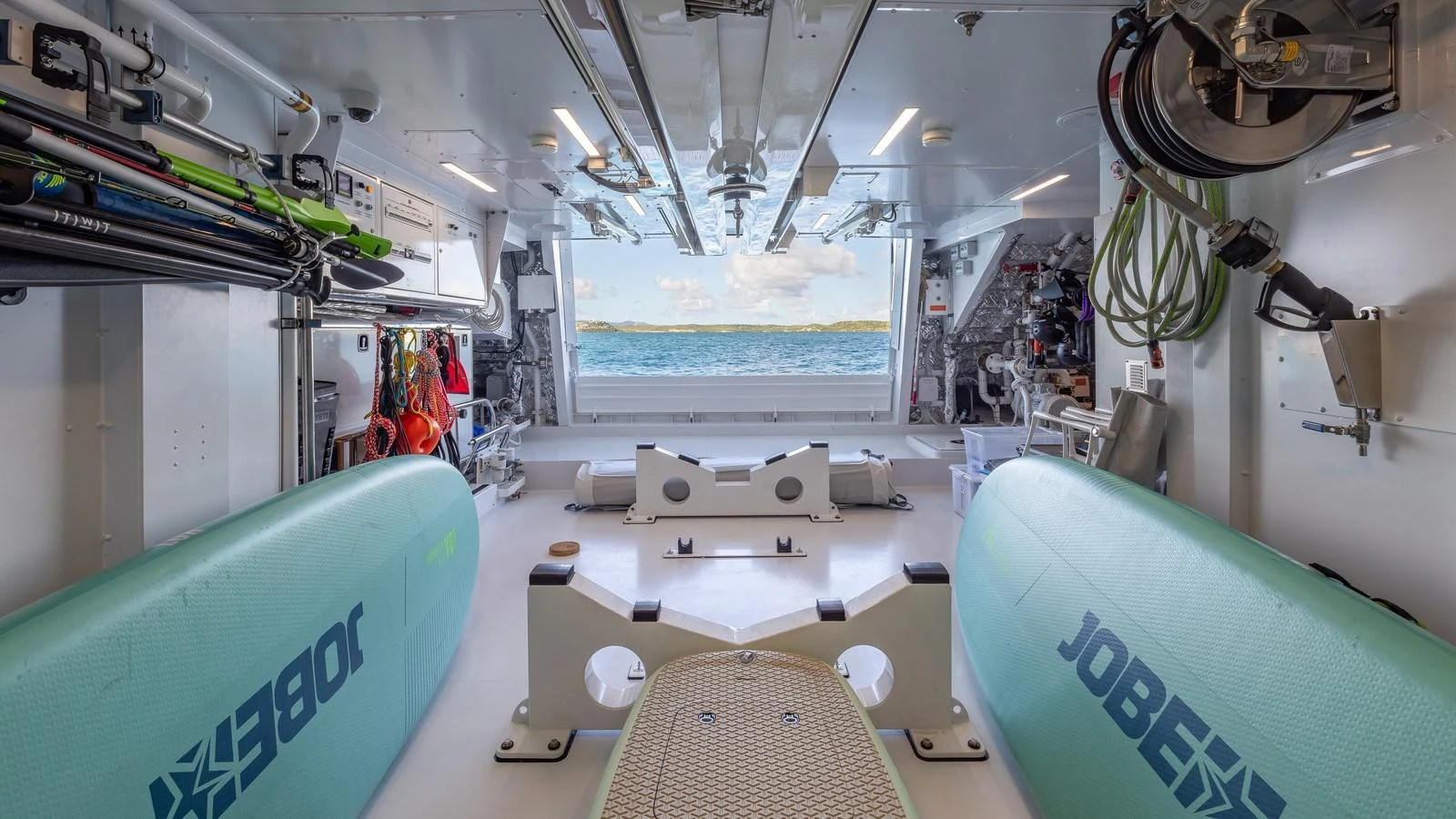 The yacht's garage is equipped with water sports gear and offers a view of the sea. aboard GIOIA Yacht for Sale