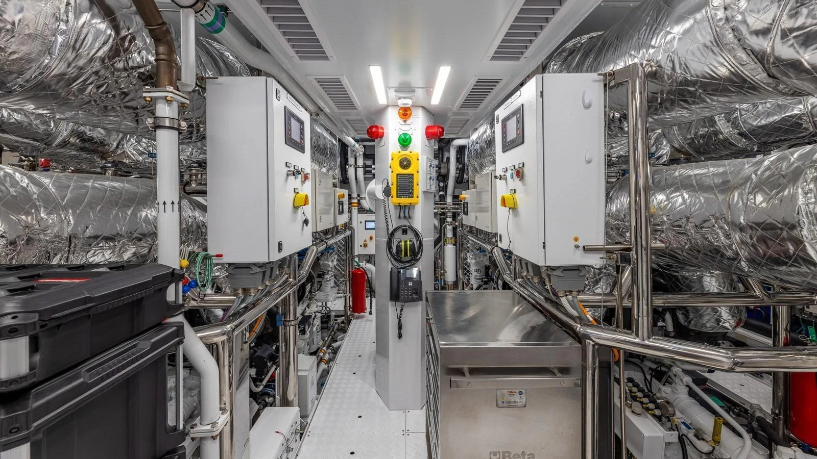 The engine room is meticulously organized with advanced machinery and control panels. aboard GIOIA Yacht for Sale
