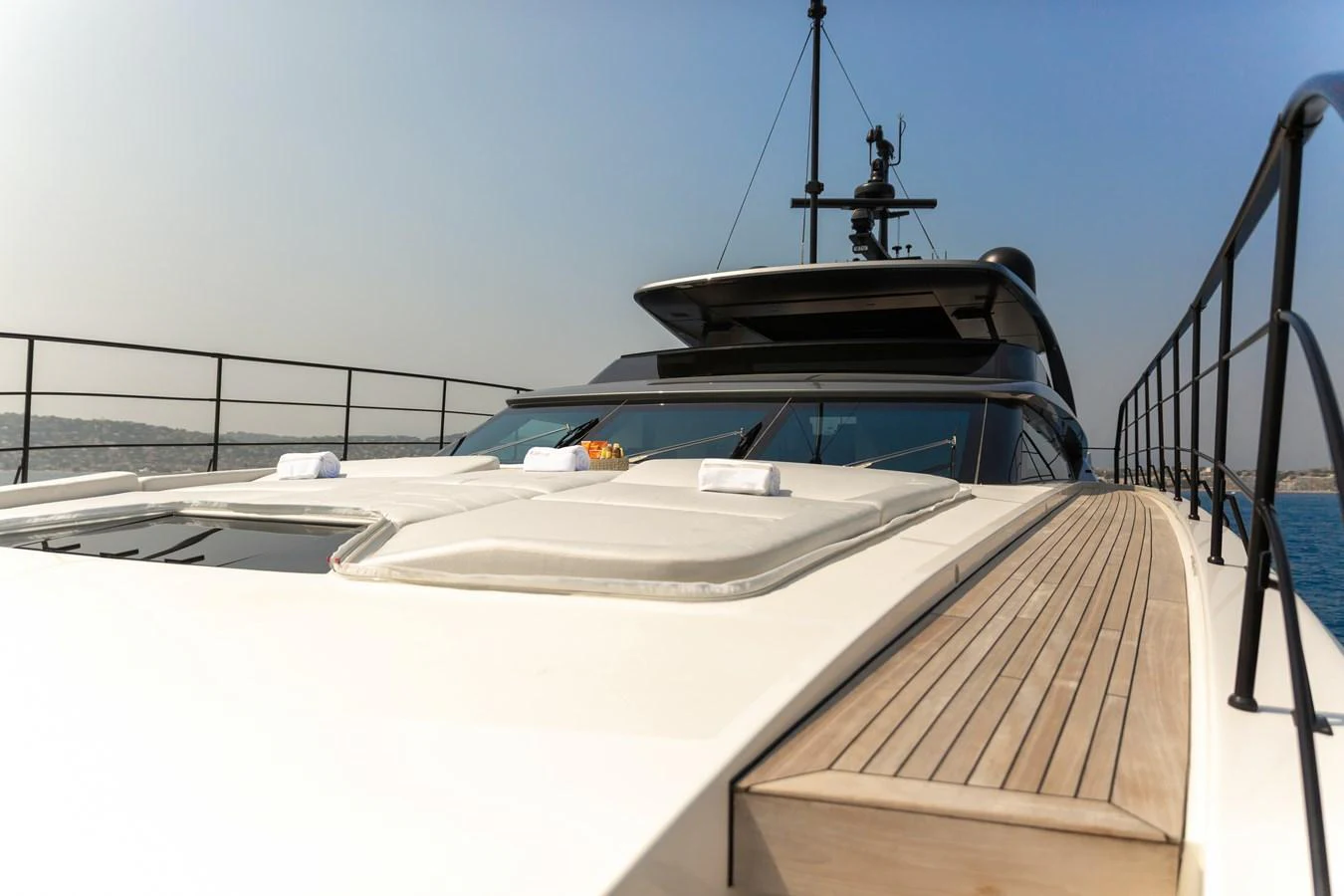 The foredeck of this yacht features sleek lines and ample sunbathing space. aboard NANGARA Yacht for Sale