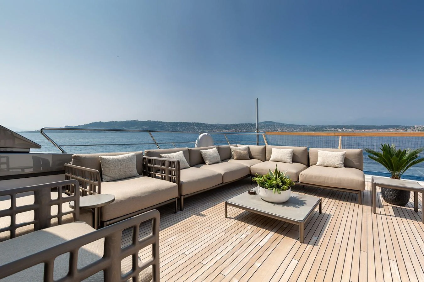 The sundeck offers a spacious and elegant lounging area with comfortable seating and stunning sea views. aboard NANGARA Yacht for Sale