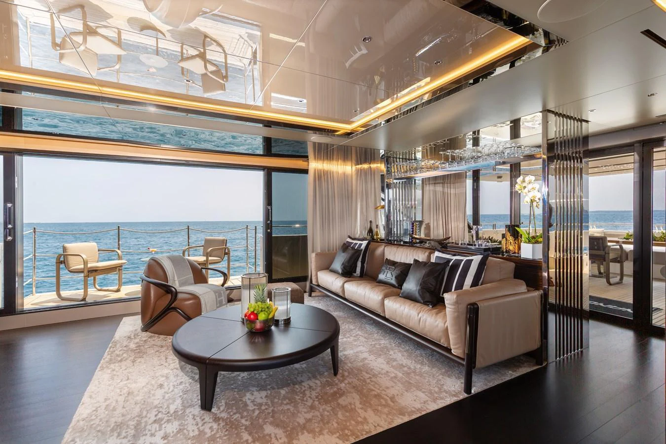 The salon offers a luxurious and spacious area with panoramic ocean views and elegant furnishings. aboard NANGARA Yacht for Sale