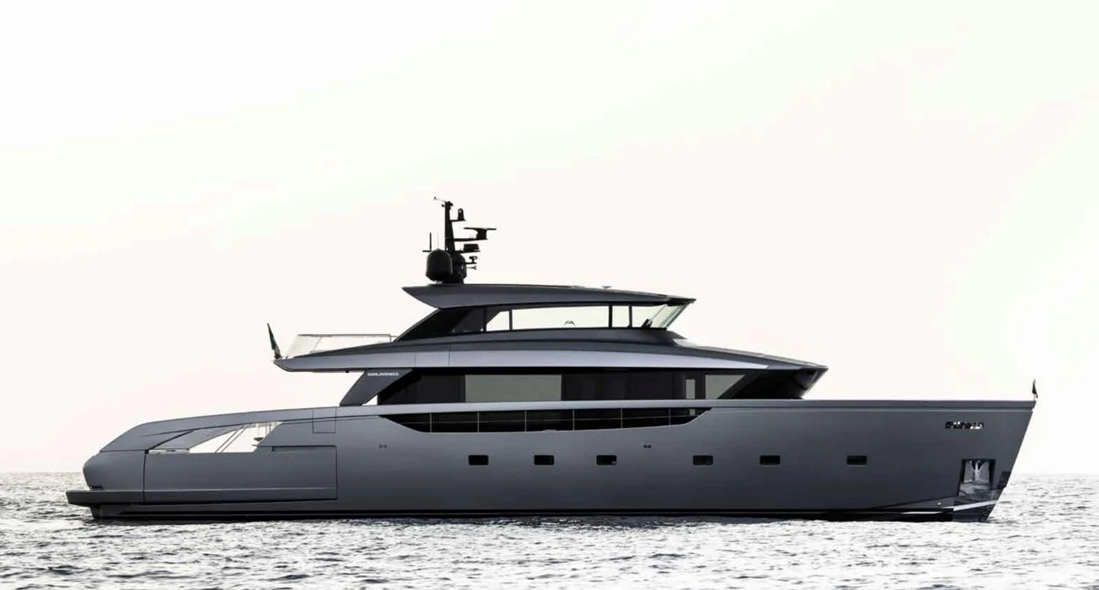 A sleek, modern yacht cruising on calm waters with a minimalist design. aboard SANLORENZO SX100/159 Yacht for Sale