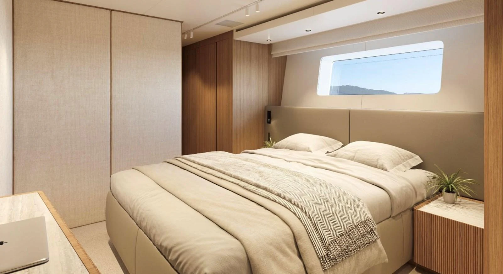 The master stateroom features a luxurious bed with modern decor and ample natural light. aboard SD90 Yacht for Sale