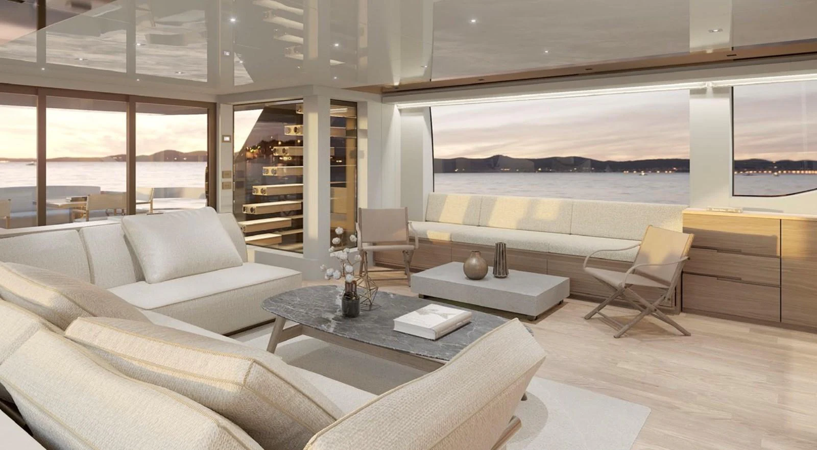 The salon offers a spacious and elegant area with panoramic views of the sea. aboard SL90A Yacht for Sale