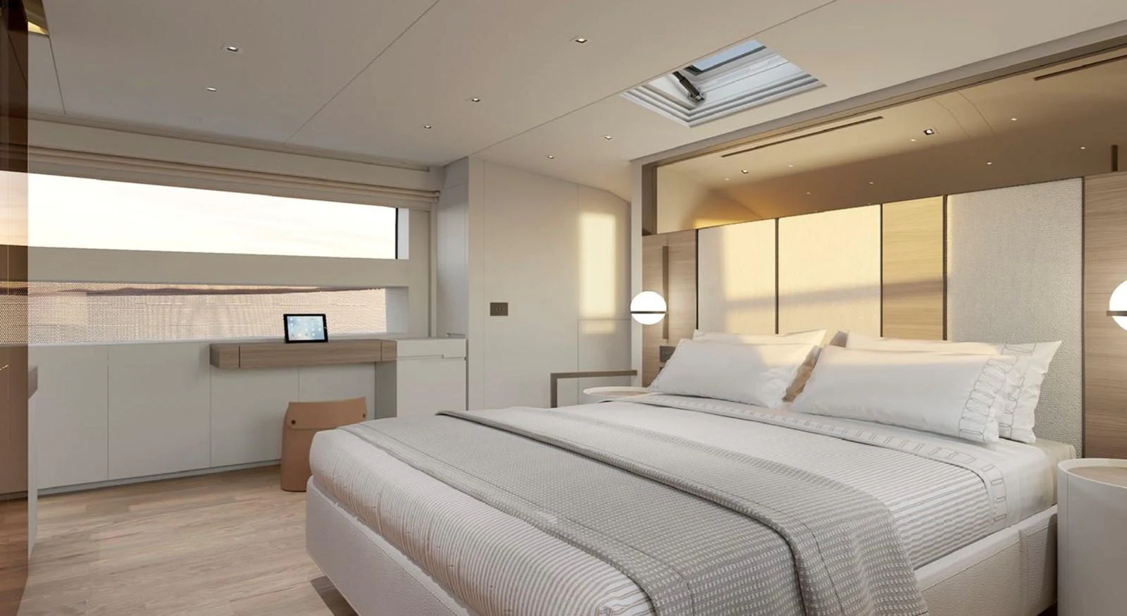 The master stateroom features a luxurious bed with elegant linens and modern lighting. aboard SL90A Yacht for Sale