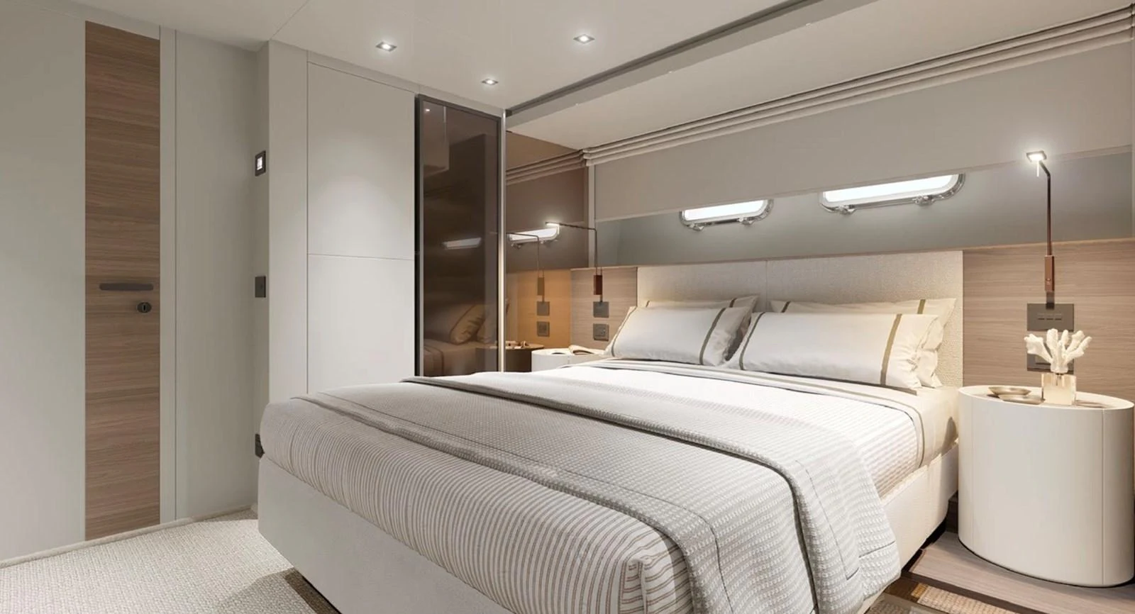 The master stateroom features a spacious bed with modern, elegant decor and ample lighting. aboard SL90A Yacht for Sale