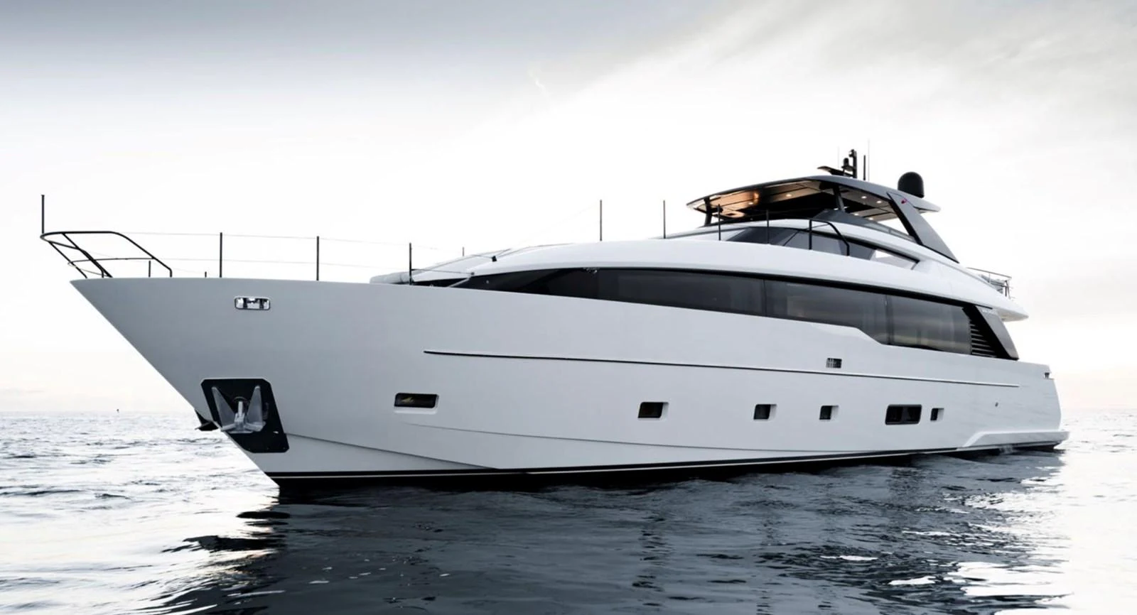 A sleek and modern yacht glides gracefully on the water, showcasing its elegant design. aboard SL86A Yacht for Sale