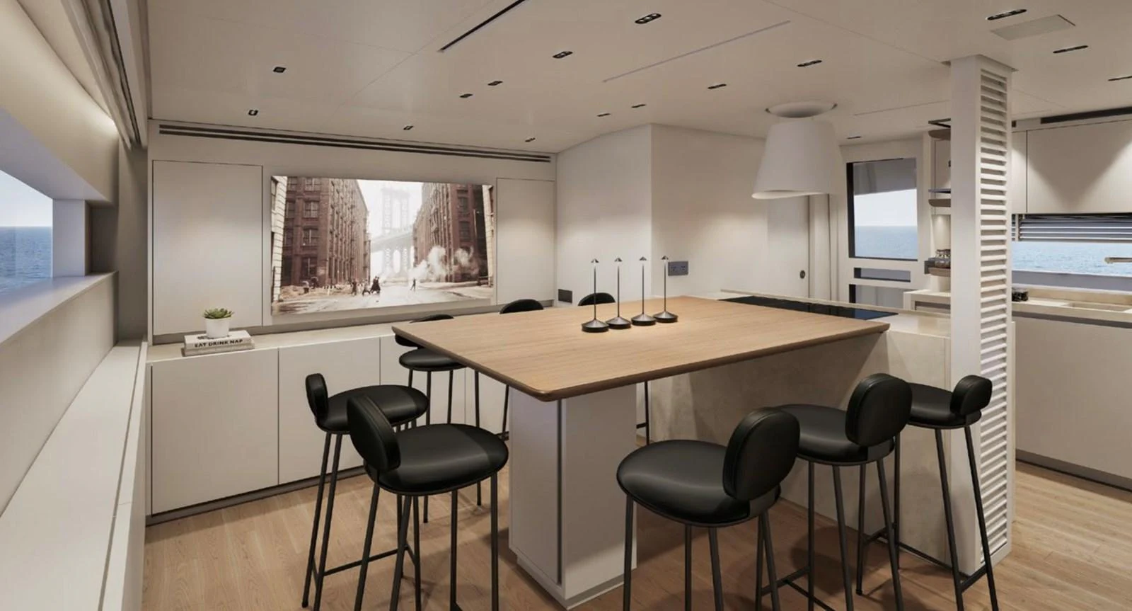 The yacht's galley features a modern design with a spacious dining area and sleek furnishings. aboard SL86A Yacht for Sale